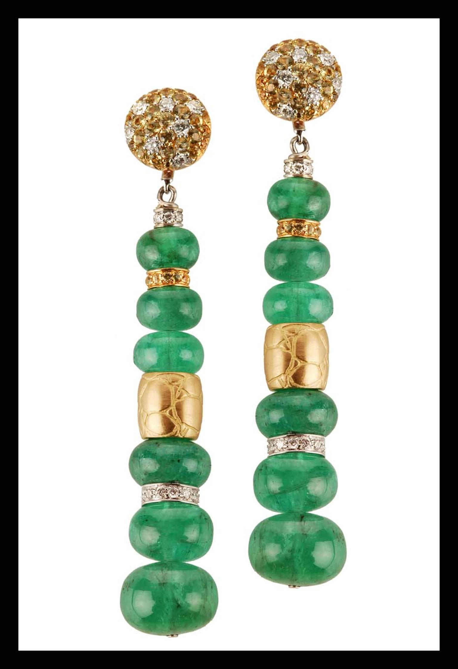 Elena C one-of-a-kind long emerald earrings with mini gold coconut textured barrels, yellow sapphires and diamonds (9,900€).