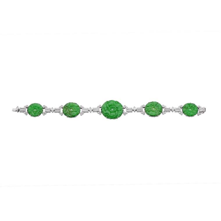 Morelle Davidson antique Cartier bracelet with circular carved jadeite discs alternating with five articulated geometric sections, four baguette diamonds, one navette diamond and 12 small single-cut diamonds.