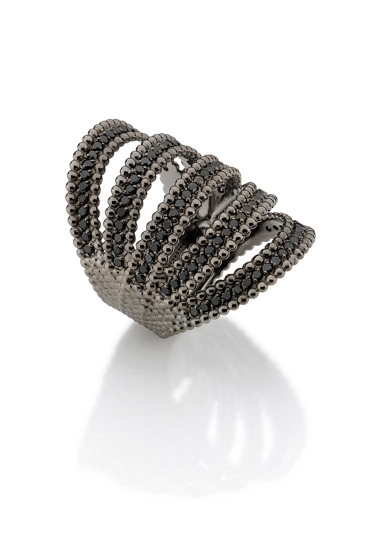 The Carla Amorim black diamond ring worn by January Jones to the 2014 Emmy Awards.