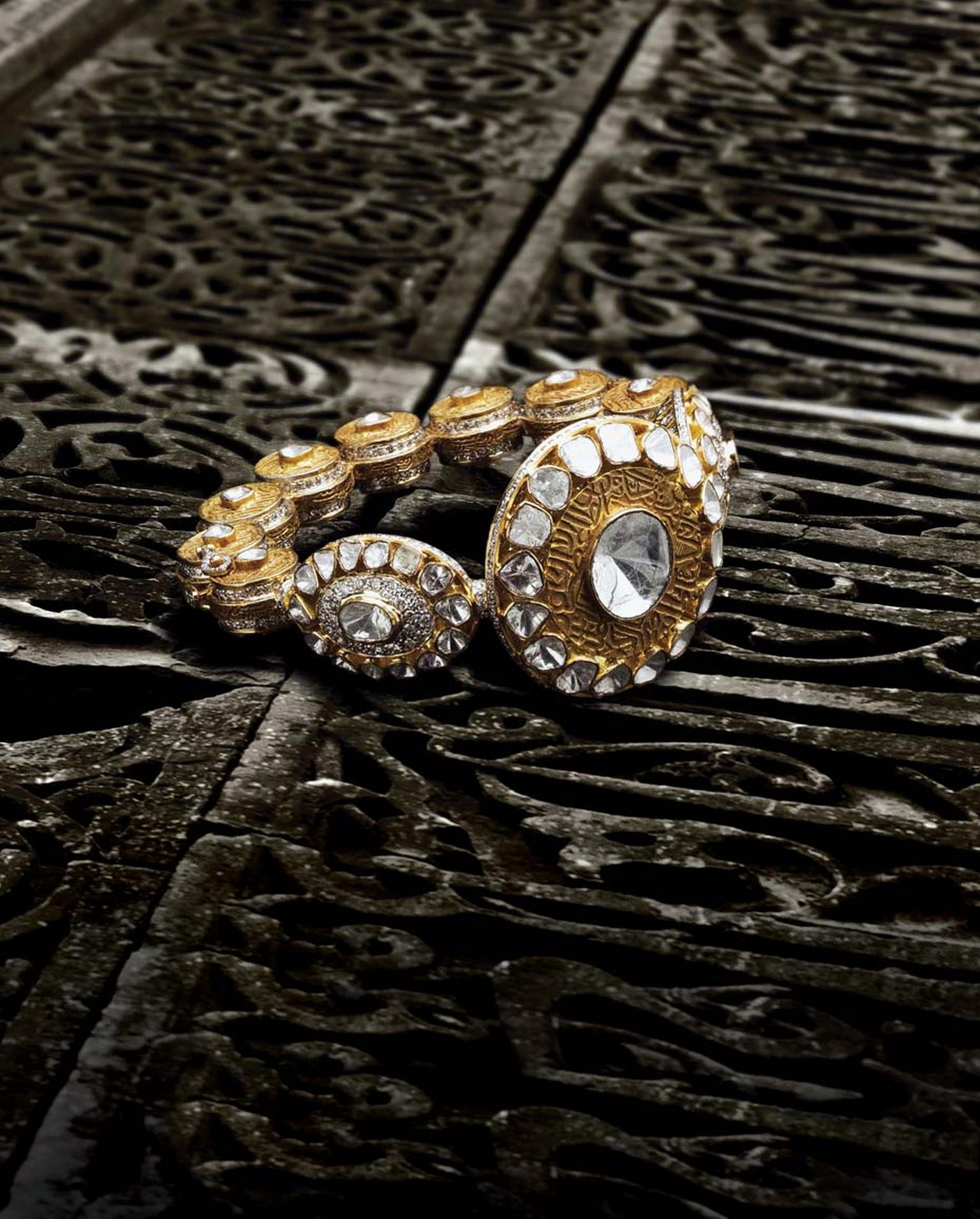 Birdhichand Ghanshyamdas Aks collection studded bangle featuring kundan polki diamonds set into gold.