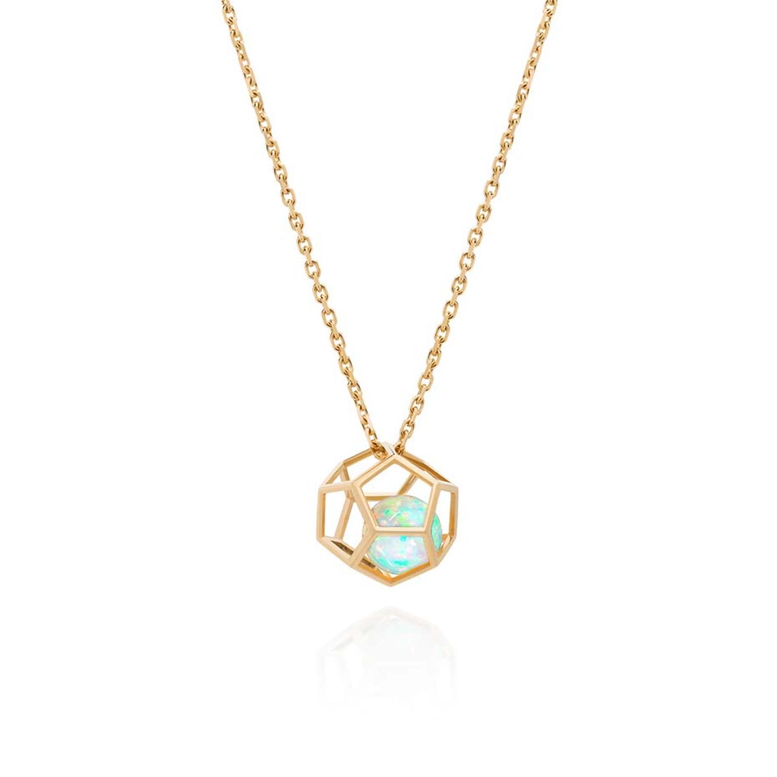 Ornella Iannuzi Rock It! necklace featuring an opal floating inside a gold dodecahedron cage.