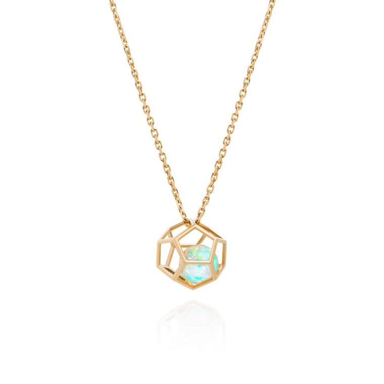 Ornella Iannuzi Rock It! necklace featuring an opal floating inside a gold dodecahedron cage.