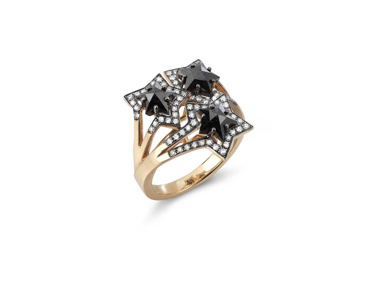 Tomasz Donocik Three Star ring with black diamond stars outlined in white diamonds.