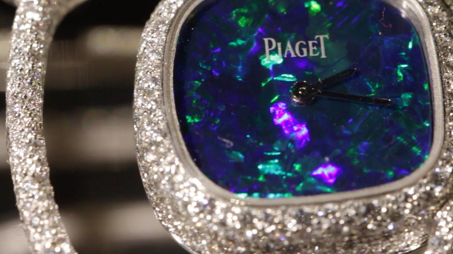 The Extremely Piaget collection Reversible cuff watch in white gold is set with 11.7ct of 2,008 brilliant-cut diamonds in a snow-setting. It also features a natural opal dial on the front and natural onyx dial on the back.
