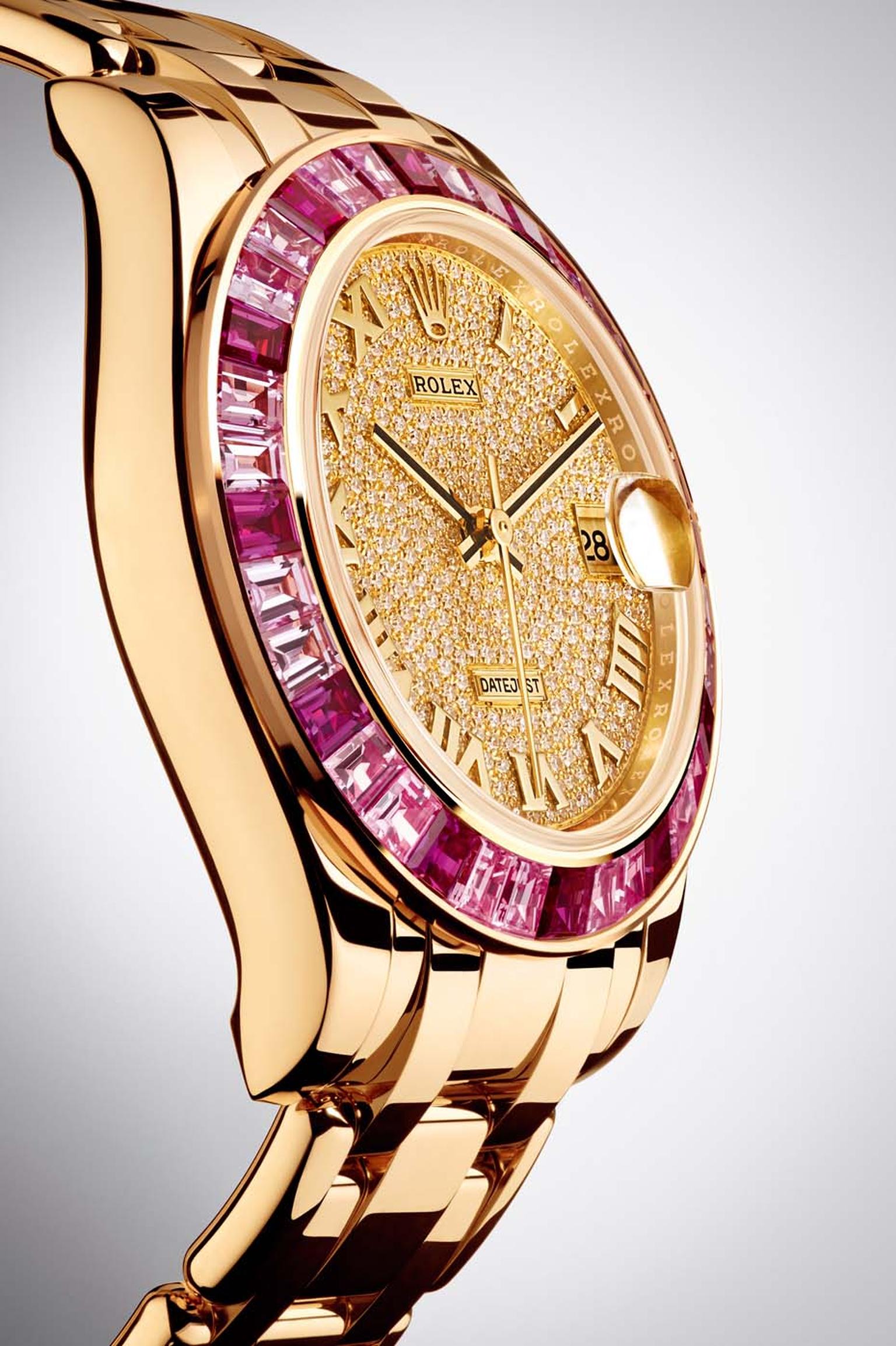 The Rolex Oyster Perpetual Datejust Pearlmaster watch is a gem-set version of the Datejust in solid yellow gold. The 34mm dial is paved with diamonds and the bezel is set with baguette-cut pink sapphires.