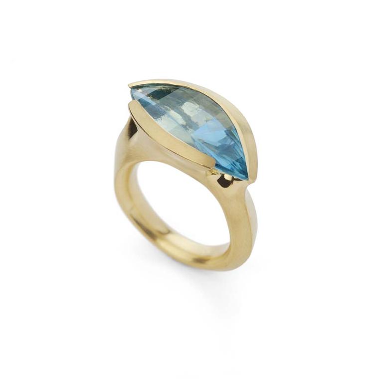 McCaul Goldsmiths Carve collection ring with a marquise-cut aquamarine set in gold.