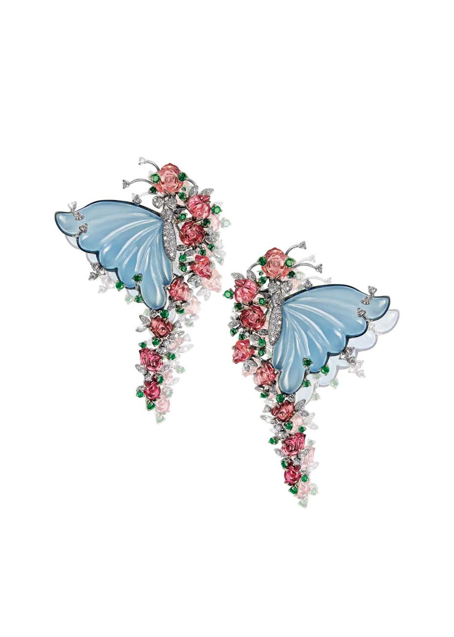 Butterfly earrings by Mirari with carved blue onyx wings, tourmaline flowers, emeralds and diamonds.