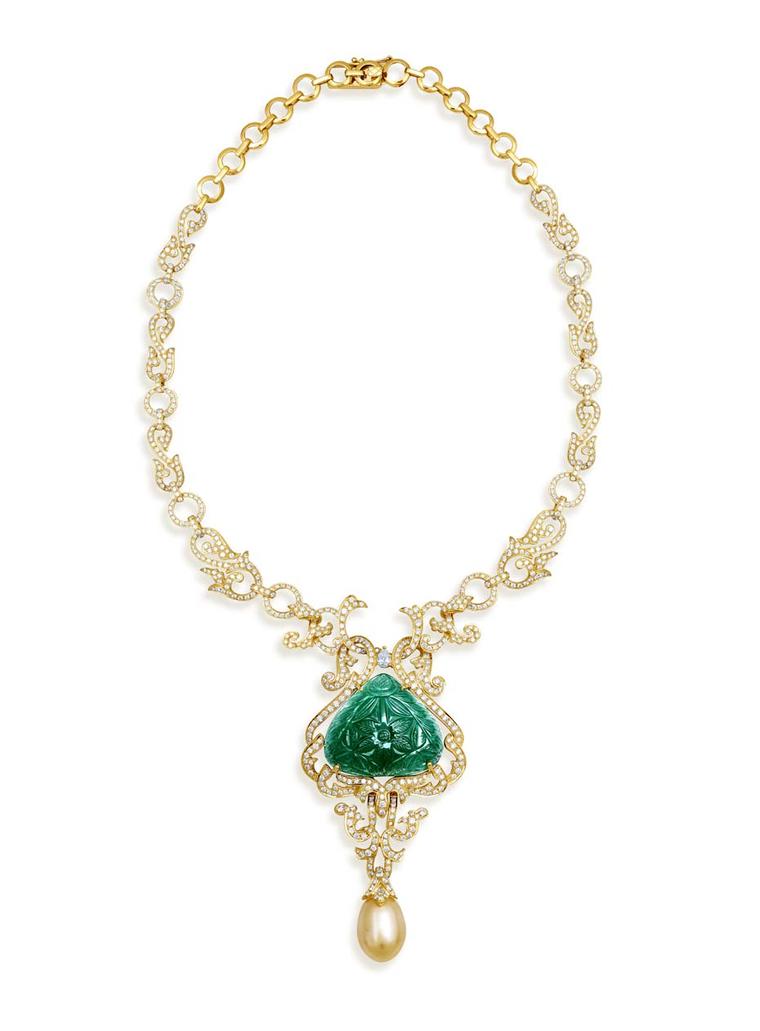 Farah Khan gold necklace with a large central carved emerald, South Sea pearl drops and diamonds, inspired by the grandeur of the Indian Maharanis.