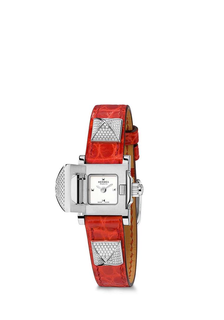 Hermès Médor watch with a smooth red agate alligator strap and three full diamond-set pyramids.