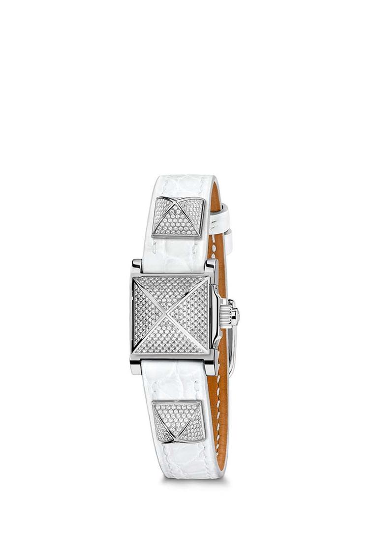Hermès Médor watch with a cloud white alligator strap and three diamond pavé set pyramids.