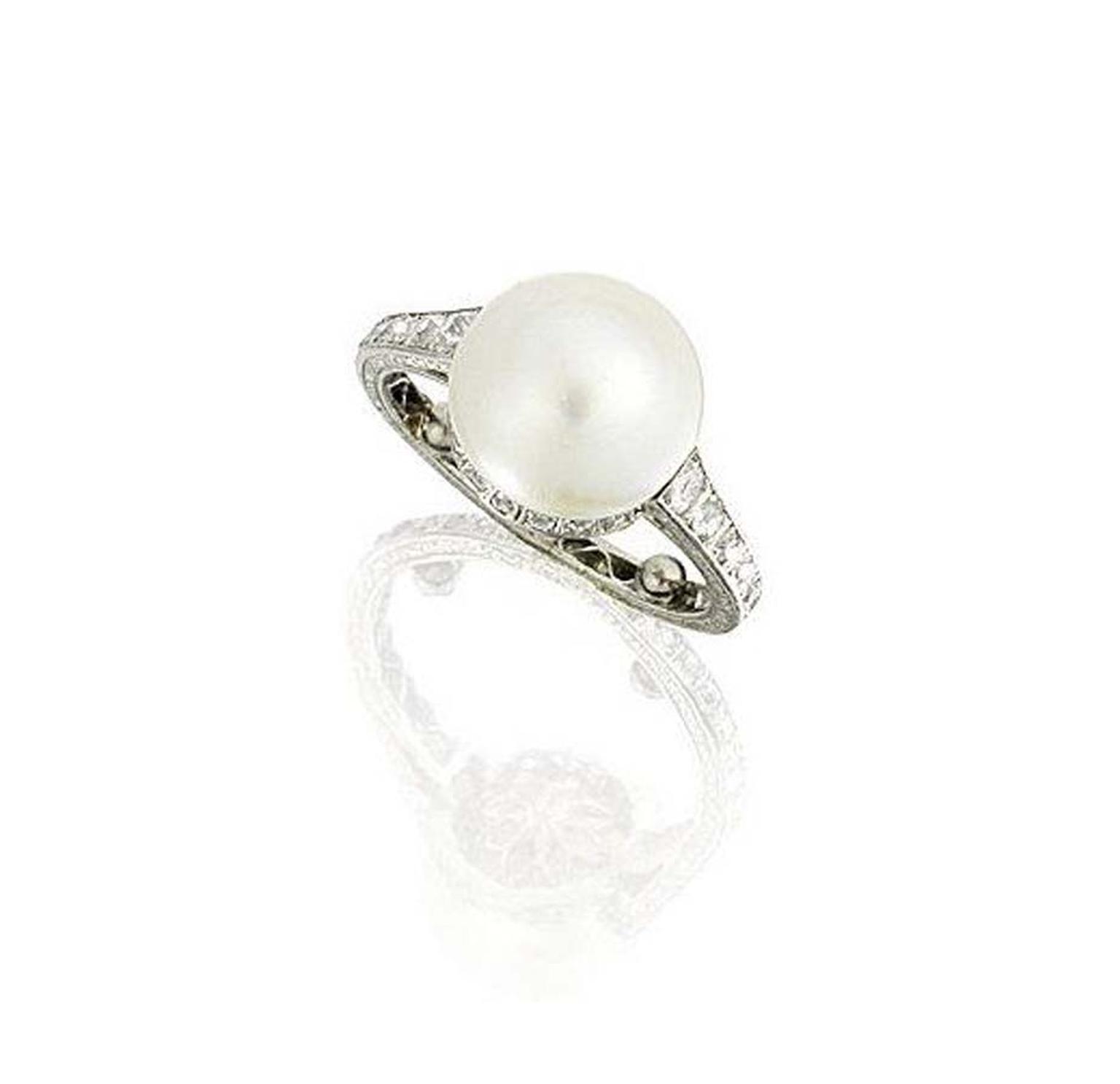 A 1930s diamond and natural pearl ring on an engraved band which sold for £47,500 at Bonhams Fine Jewellery sale.