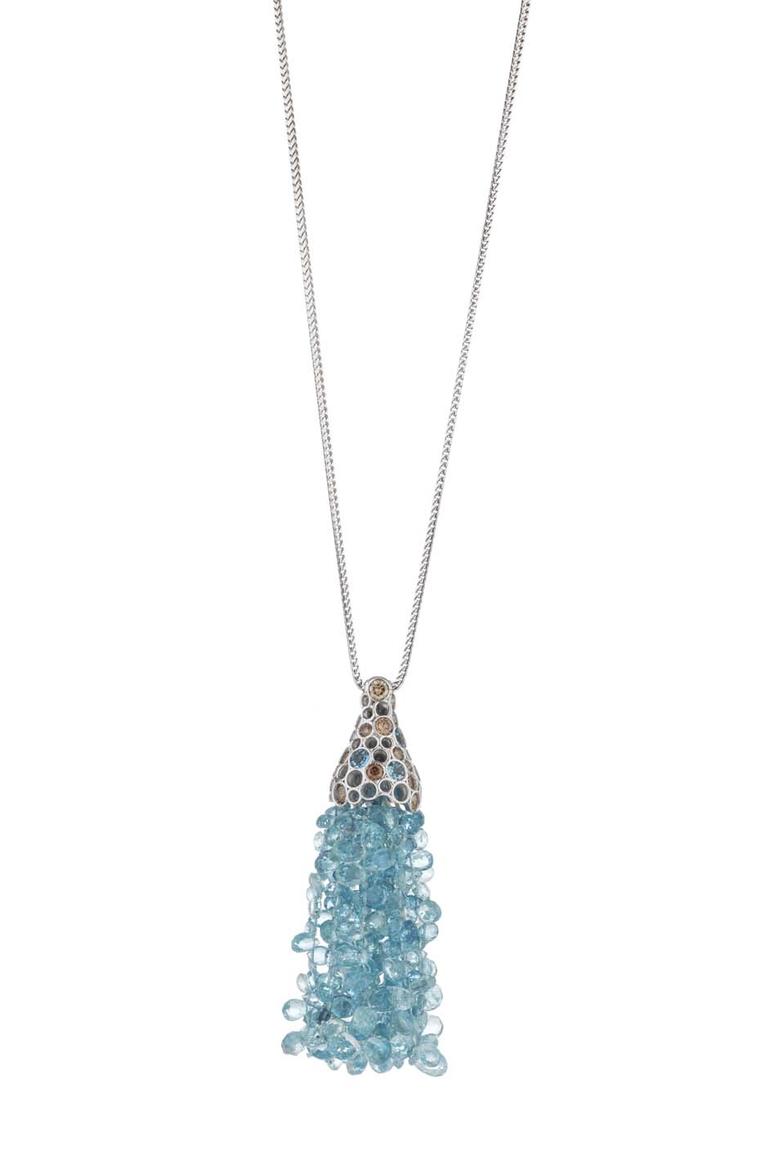 Holts London Serpentine pendant with a blue aquamarine tassel suspended from a studded setting featuring brown diamonds and blue aquamarines (£3,950).