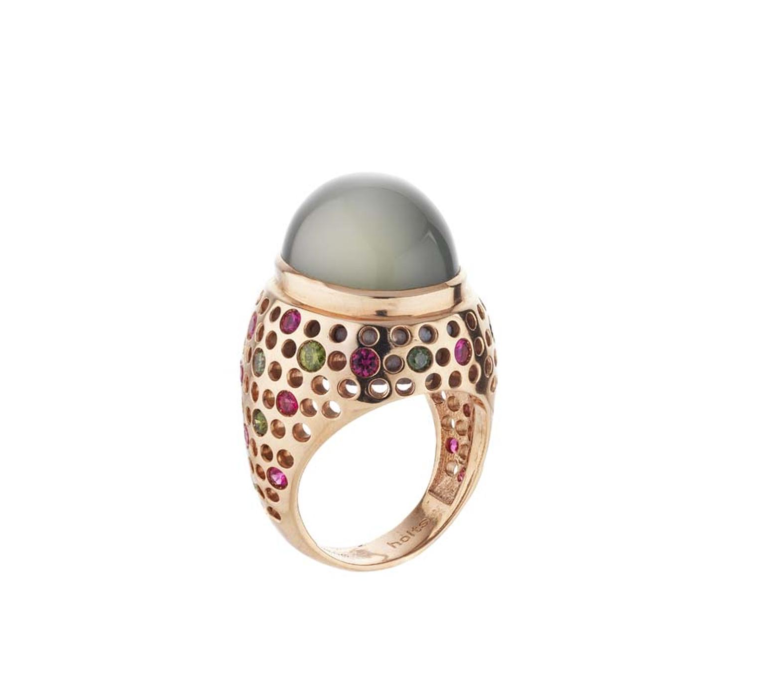 Holts London Vivienne ring with a central moonstone set in a rose gold band studded with natural pink spinels and green diamonds (£3,950).
