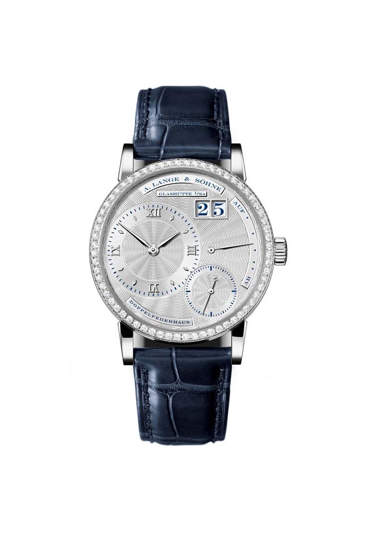 The Little Lange 1 for women in white gold, with a solid silver dial, sparkles with a diamond bezel set with 64 brilliant-cut diamonds.