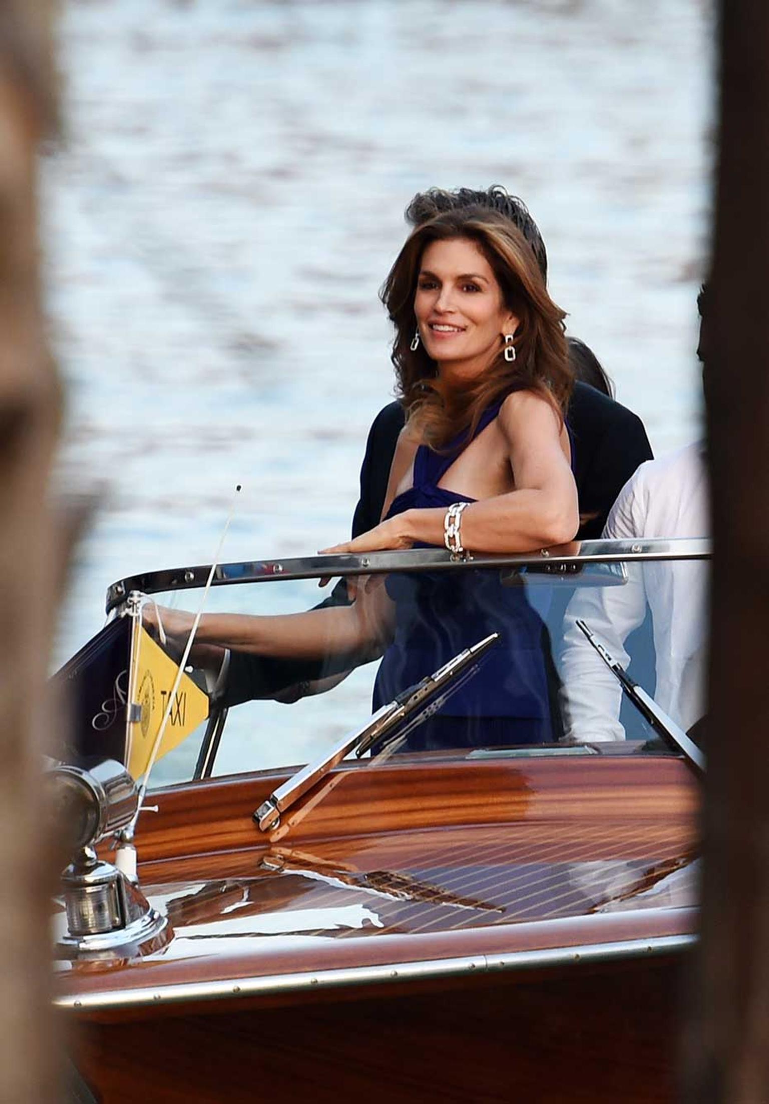 Cindy Crawford was one of many celebrity guests who celebrated the marriage of the world's most eligible bachelor, George Clooney, to the British-Lebanese lawyer Amal Alamuddin this weekend in Venice, accessorised with a generous sprinkling of Harry Winst