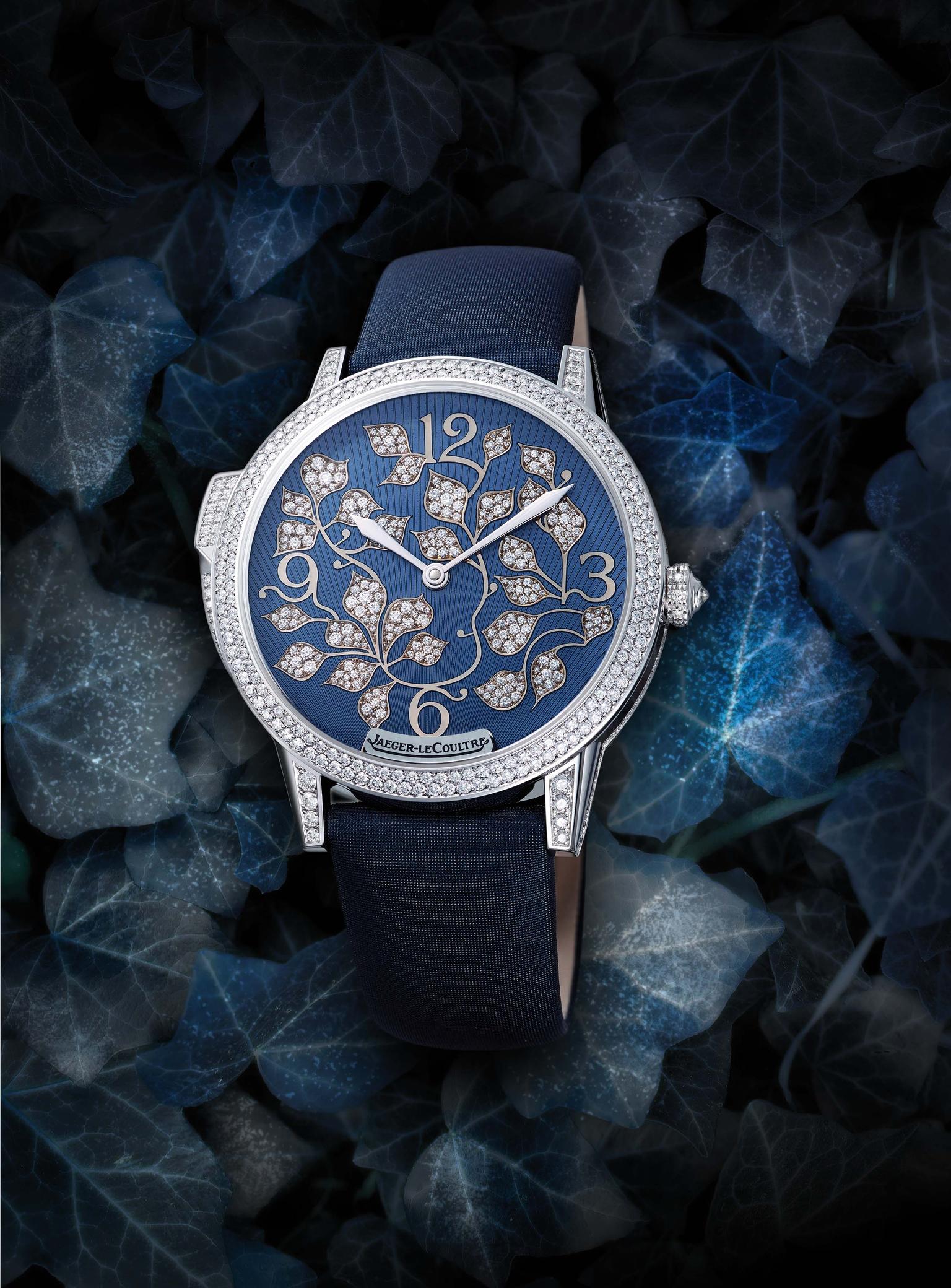 The new Jaeger-LeCoultre Rendez-Vous Ivy Minute Repeater watch for women mmediately seduces the eye with its snow-set diamond ivy leaves that swirl across the deep blue enamel dial, which is decorated with a sunburst guilloché motif.
