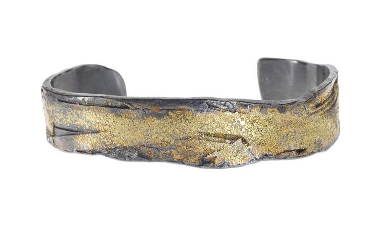 Todd Reed bracelet with yellow gold and sterling silver patina.