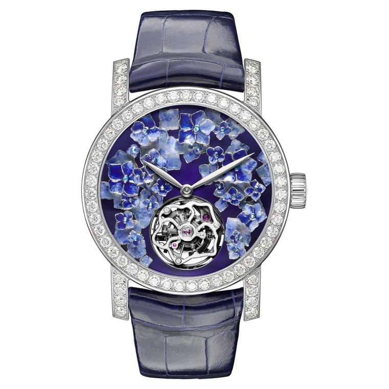 Chaumet limited-edition Hortensia automatic tourbillon watch in white gold, set with diamonds surrounding a dial of hydrangea flowers, sculpted and hand-engraved with Grand Feu enamelling.