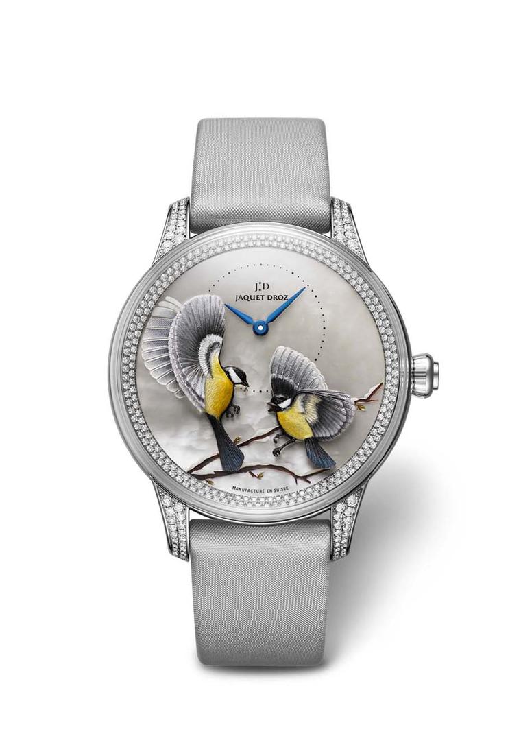 Jaquet Droz' Petite Heure Minute Relief Saisons watch features birds that were sculpted and engraved in gold before being applied to the dial and painted by hand.