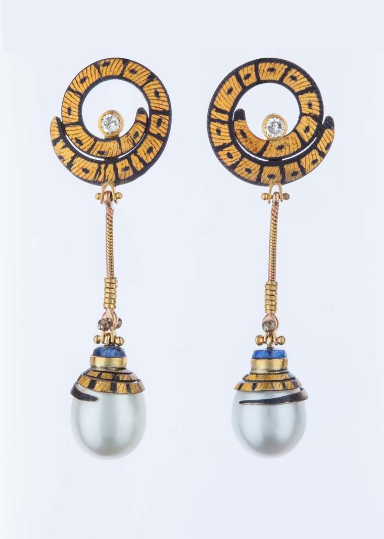 Michael Boyd gold earrings with pearl drops.