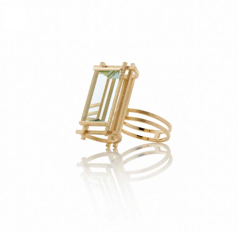 Shimell and Madden's Prism collection Large Aqua Frame ring in textured yellow gold with a  6.63ct mirror-cut aquamarine.