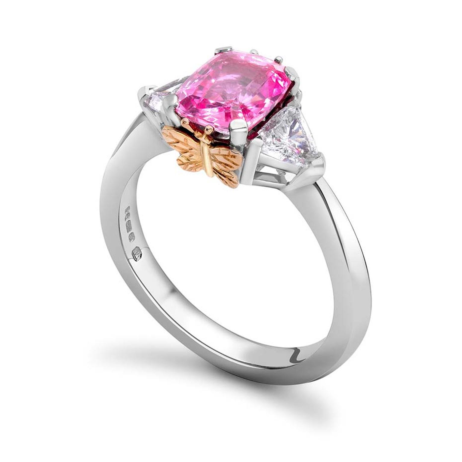 Theo Fennell pink sapphire and diamond Butterfly ring in white gold with a pink gold butterfly perched on the side of the centre stone.