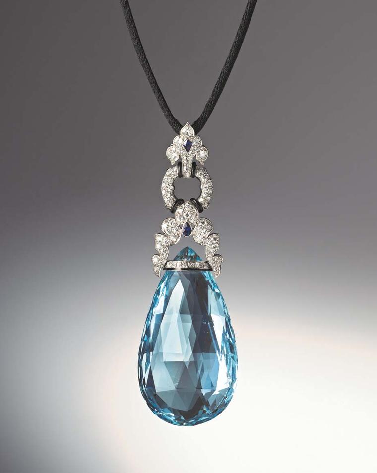 Art Deco aquamarine briolette pendant set with diamonds, two fancy-cut sapphires as well as bands of black enamel set in platinum by Marzo, Paris, circa 1925. Exhibited by Hancocks.