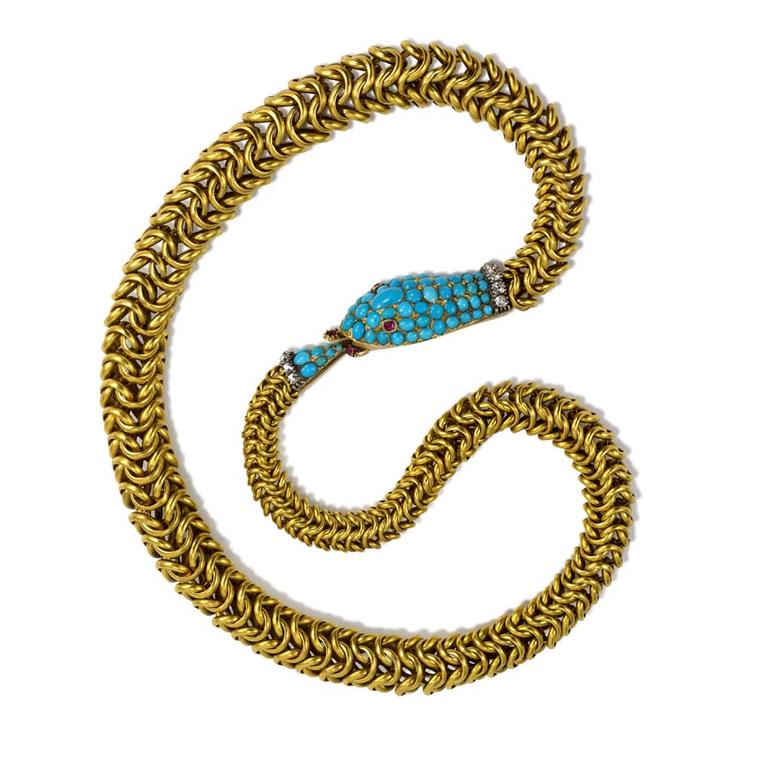 An antique gold box chain in the form of an Ouroboros snake with a pavé turquoise head and tail with diamonds and rubies, circa 1870. Exhibited by Kentshire.