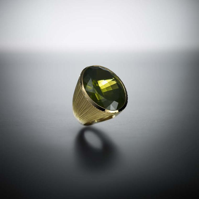 Walid Akkad peridot and textured gold ring.