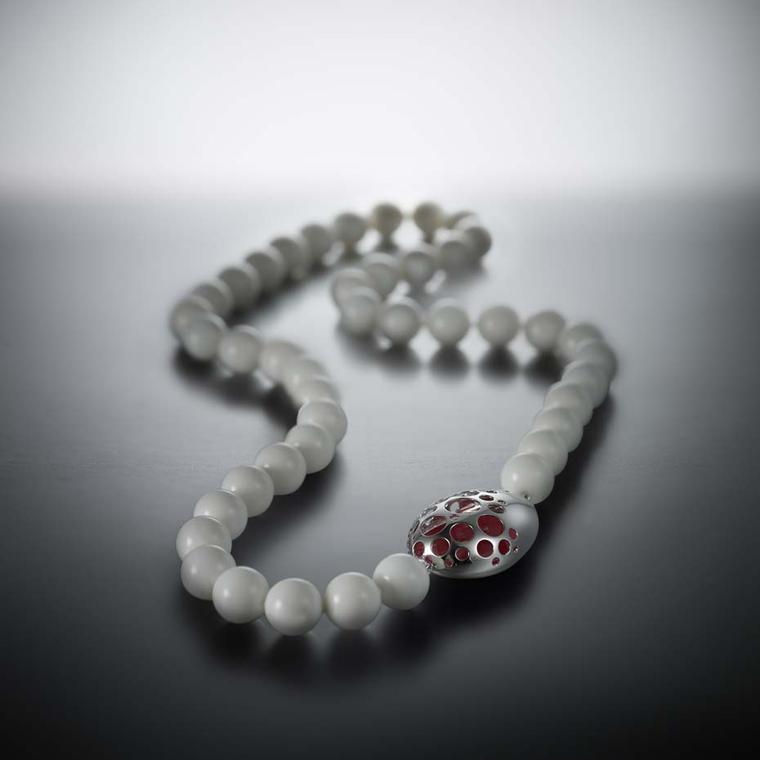 Walid Akkad chalcedony bead necklace with a fuchsia pink enamel clasp set in white gold.