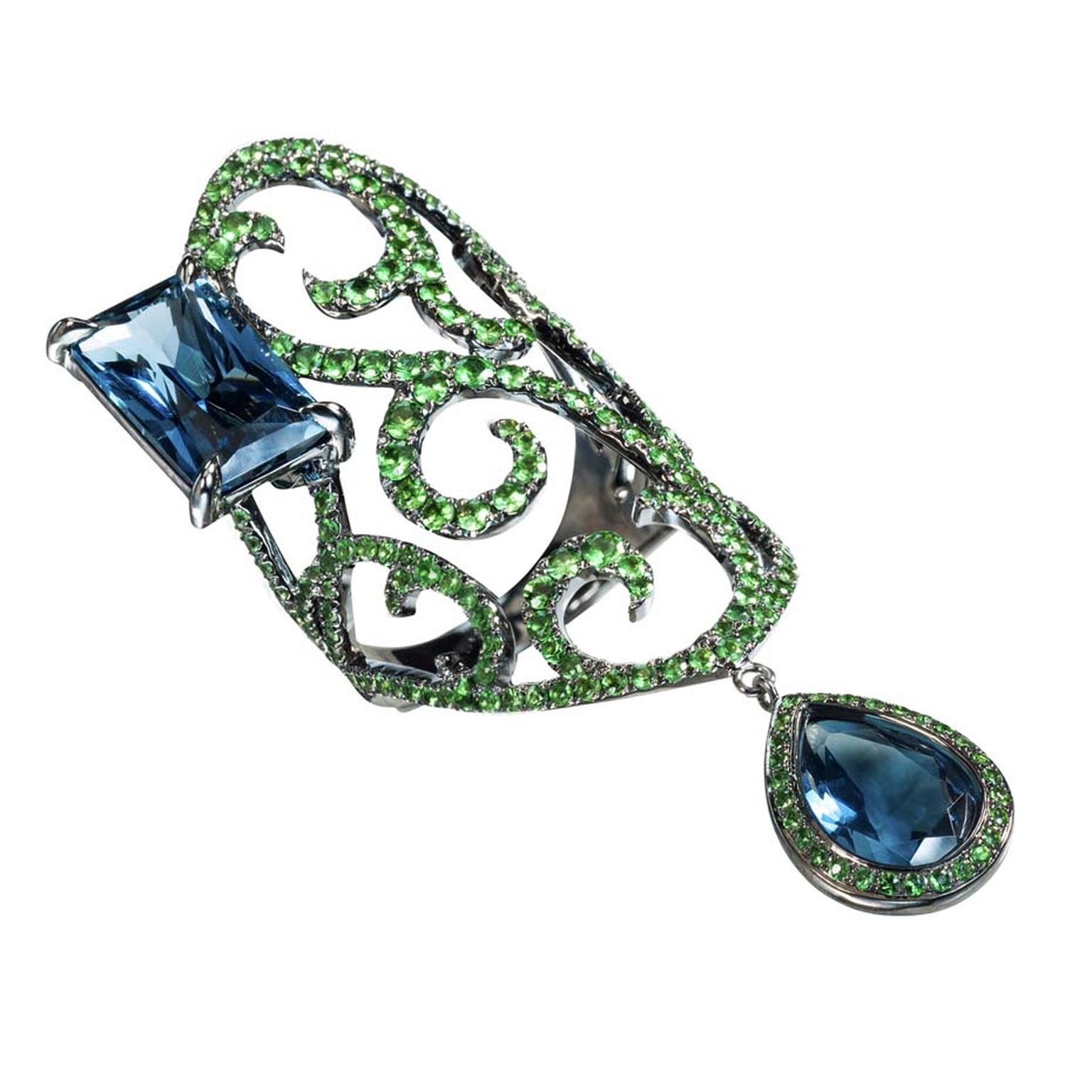 Dionea Orcini white gold arabesque Jaipur ring featuring tsavorites and London blue topaz.