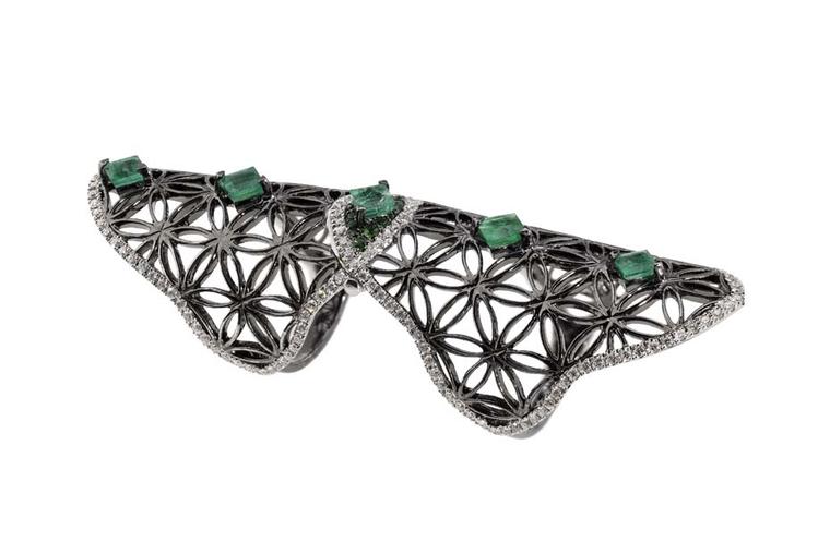 Dionea Orcini Semiramis white and black gold double ring with the Flower of Life sacred geometry pattern set with diamonds, emeralds and tsavorites.