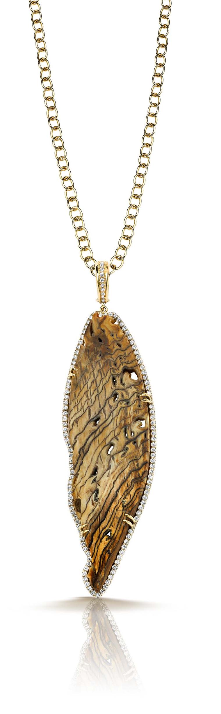 Pamela Huizenga gold pendant with a fossilized Sequoia center stone and a diamond pavé frame ($14,000).
