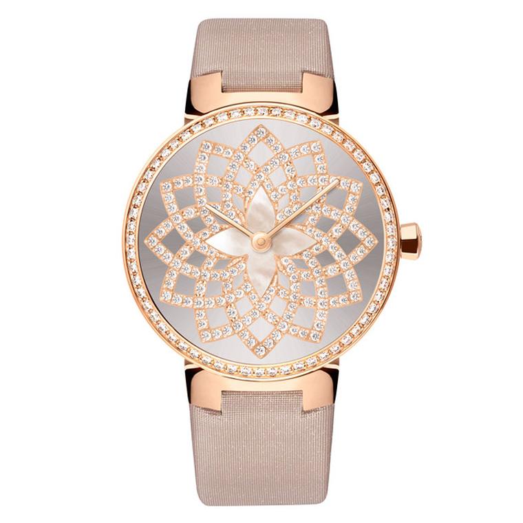 The Louis Vuitton Tambour Monogram Infini timepiece features the maison's signature flower motif adorning a sunray dial, with a mother-of-pearl centre and 12 overlapping rose gold petals set with pavé diamonds.