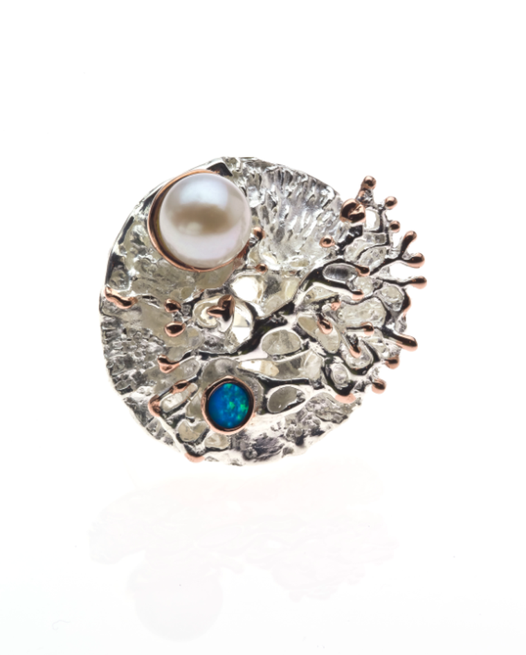 Keiko Uno Coral Garden ring with an opal and freshwater pearl.