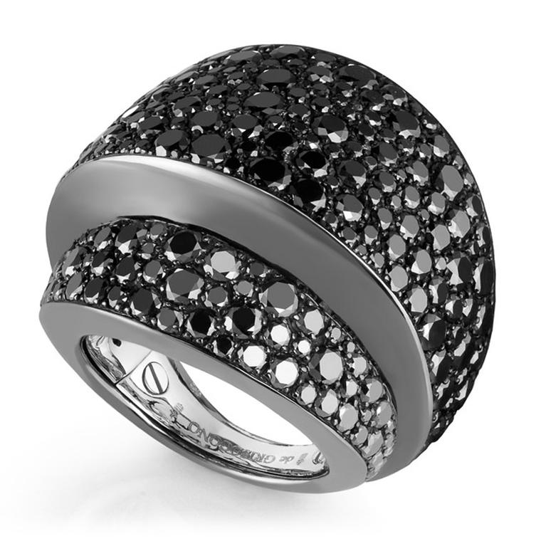 De Grisogono Tubetto diamond ring features smooth curves of black rhodium-plated white gold covered in pavé-set black diamonds.