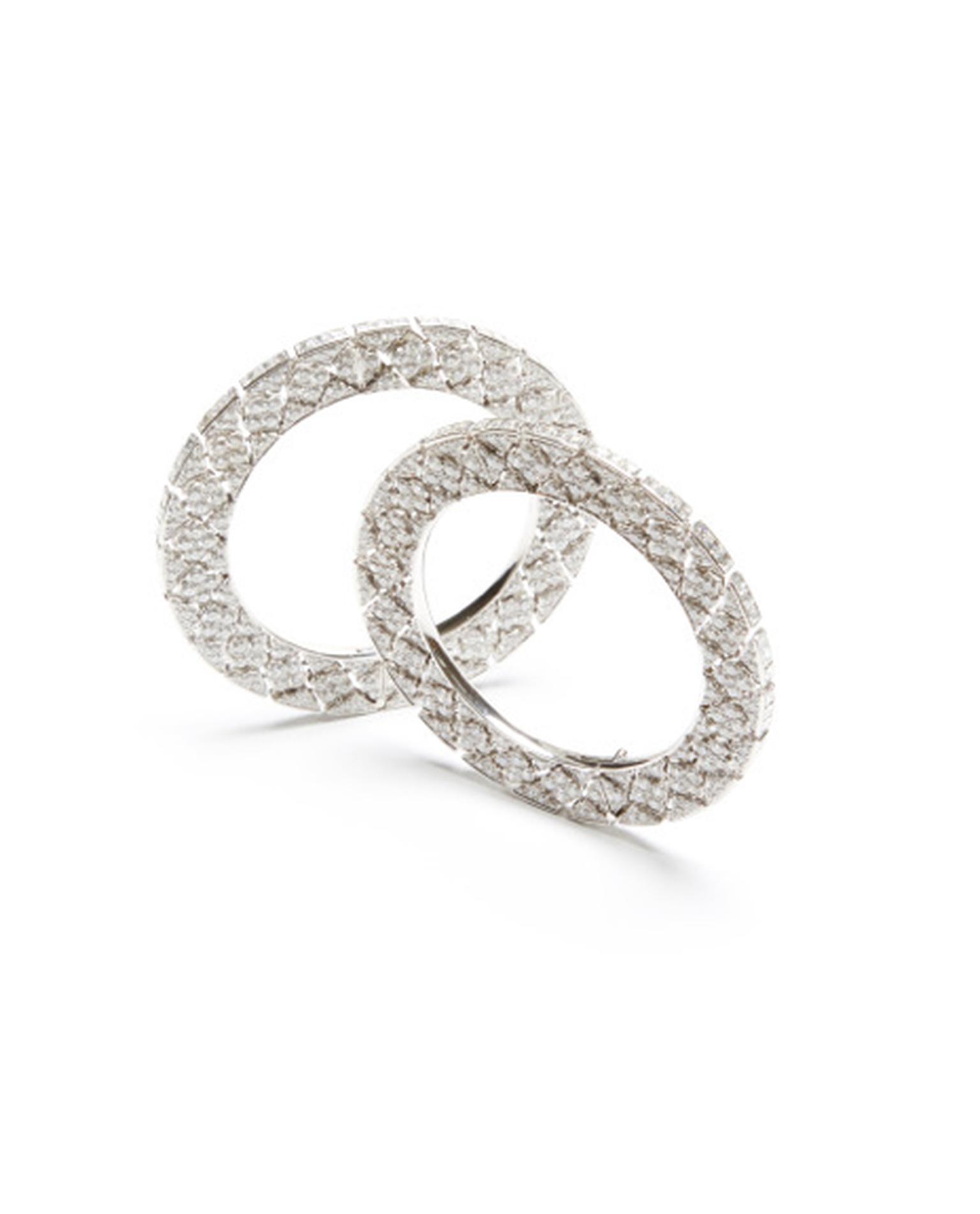 Pair of diamond bangles by famed Indian jeweller Bhagat set with 50.66ct diamonds and an additional 21.12ct of carré-cut diamonds. $480,000 at Moda Operandi.