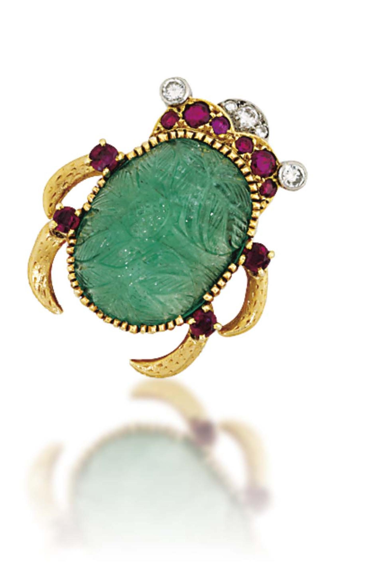 Lot 220 is an emerald, ruby and diamond Scarab brooch signed by Cartier (estimate: £8,000-12,000). Christie's Important Jewels Sale on 26 November at King Street in London.