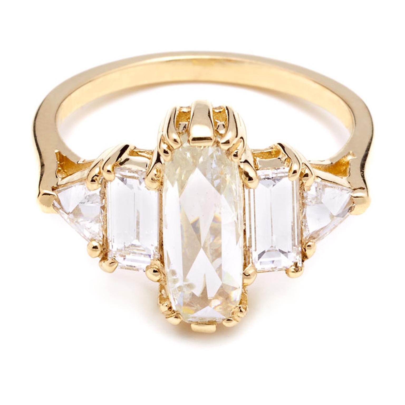 Anna Sheffield Theda ring, with a central elongated rose-cut pale yellow diamond flanked by four white diamonds in yellow gold.