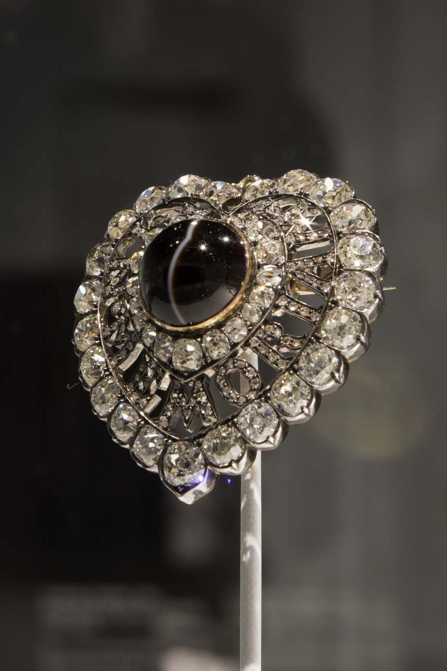 The prestigious Rothschild collection has lent some outstanding examples of Victorian Mourning jewelry, including a heart-shaped diamond brooch with the words “In Memoriam” spelt out in a display of virtuoso craftsmanship.
