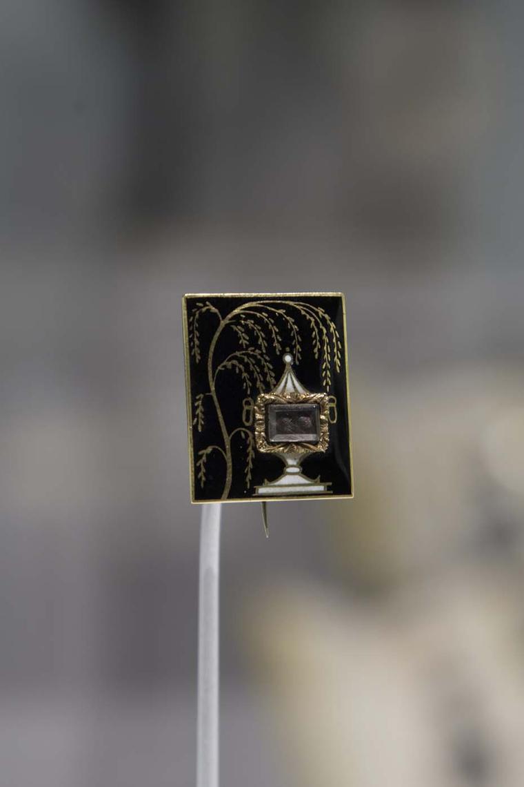 Women were required to follow strict guidelines when it came to what they wore, from their black gowns to their jewelry, which was full of classical and Christian symbols of bereavement. Pictured is a handcrafted gold and onyx Mourning brooch.