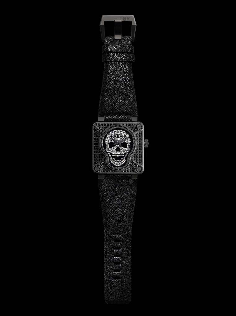 Bell & Ross' BR 01 Skull and Cross Bones watch features a smiling skull at the centre of a studded white diamond dial while black diamonds cover the bones, bezel and case front.