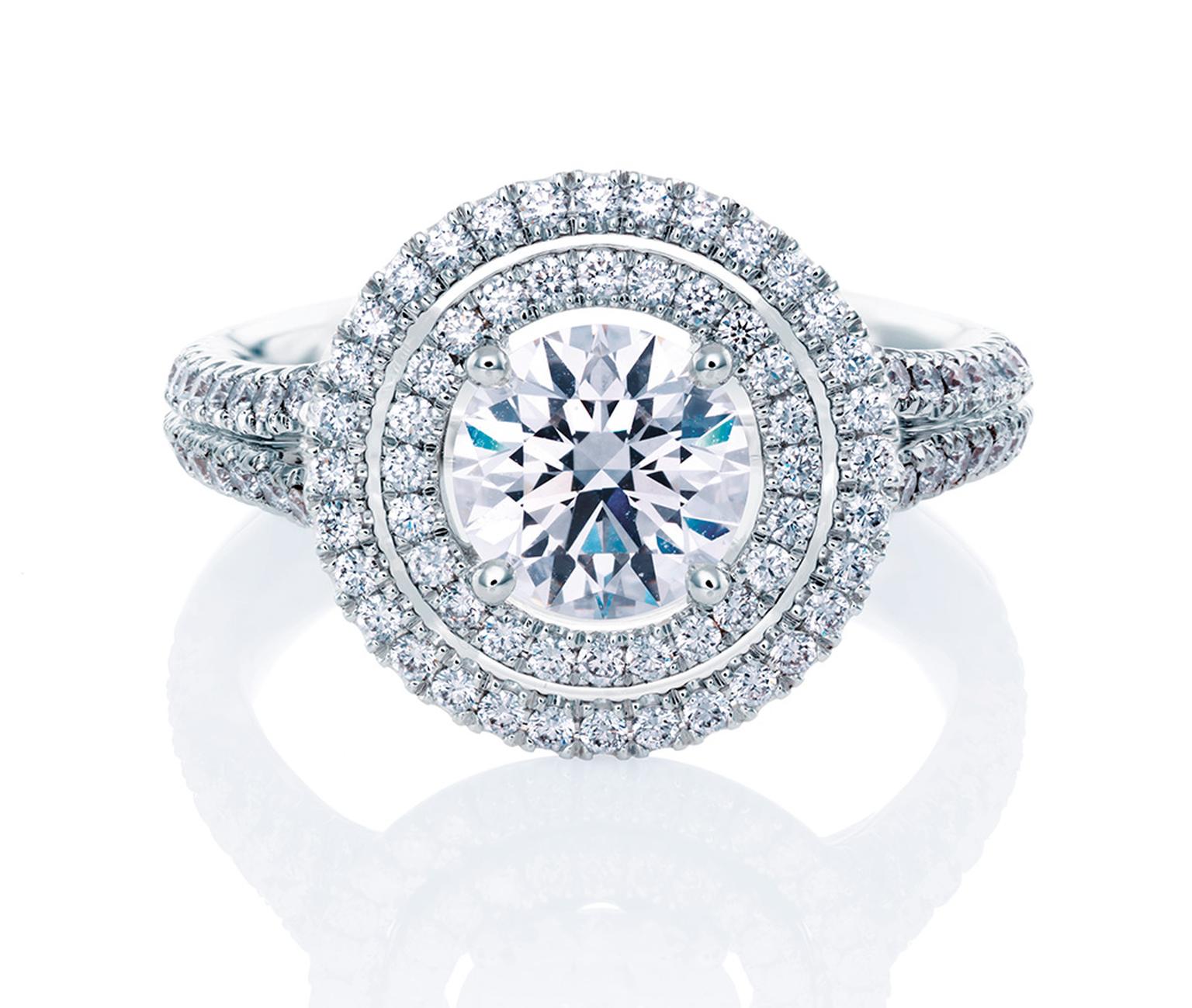 De Beers Aura Double Halo ring in platinum, set with a central round, brilliant-cut diamond and micro pavé diamonds (from: £7,650).