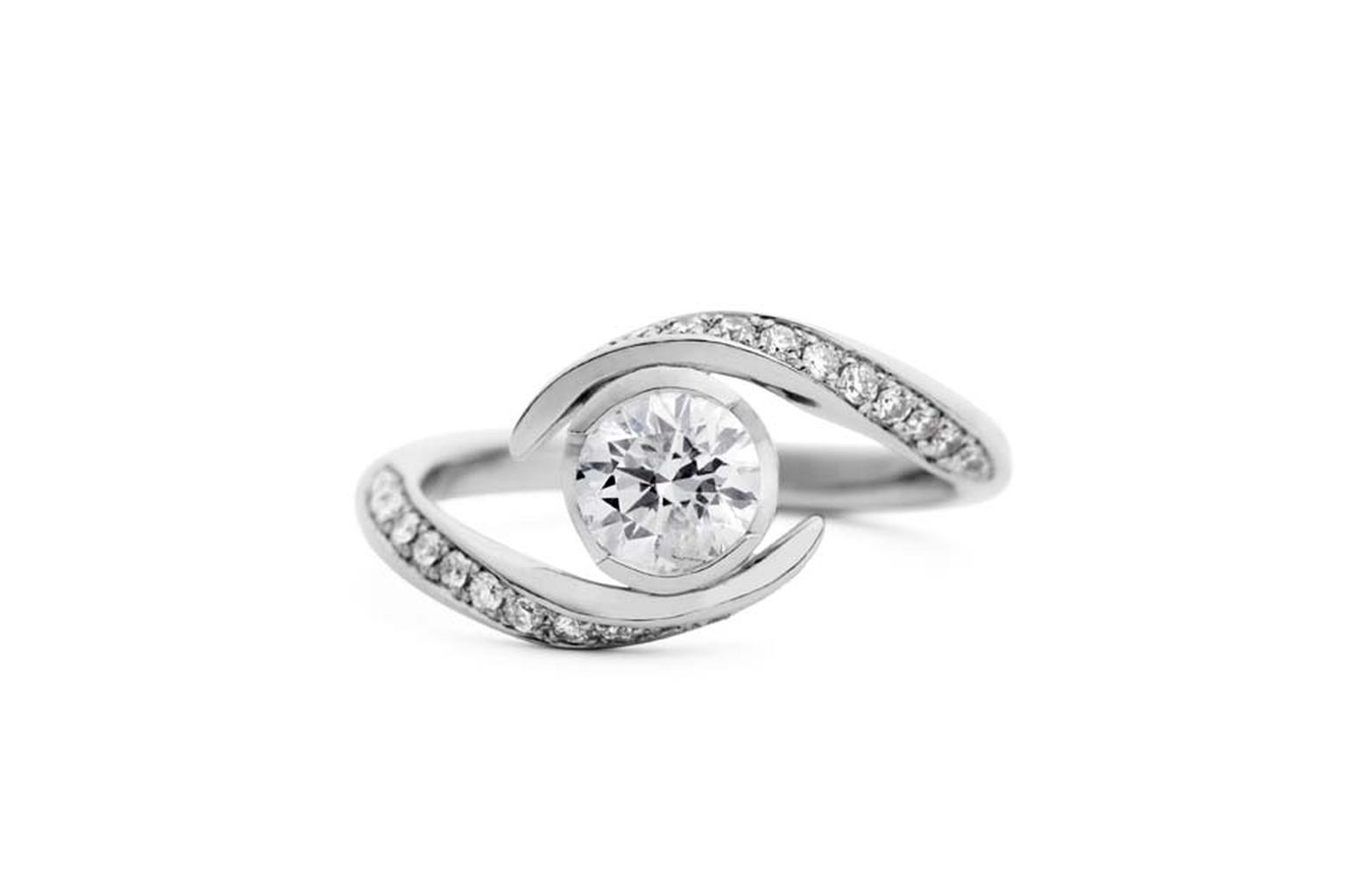 Jessica Poole Hexagon solitaire diamond engagement ring in brushed platinum with white diamonds.