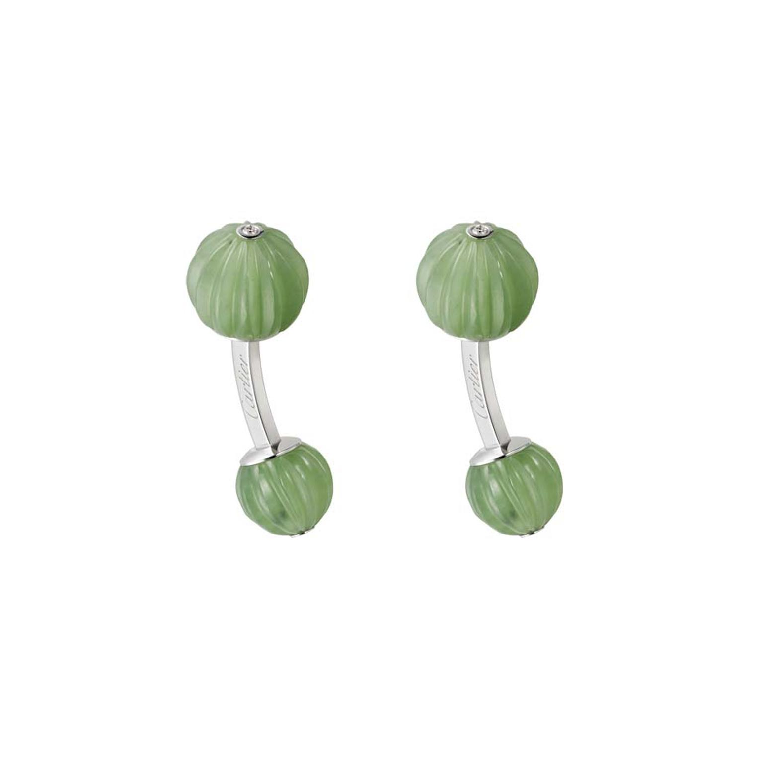 Cartier white gold cufflinks featuring sculpted jade nephrite and diamonds.