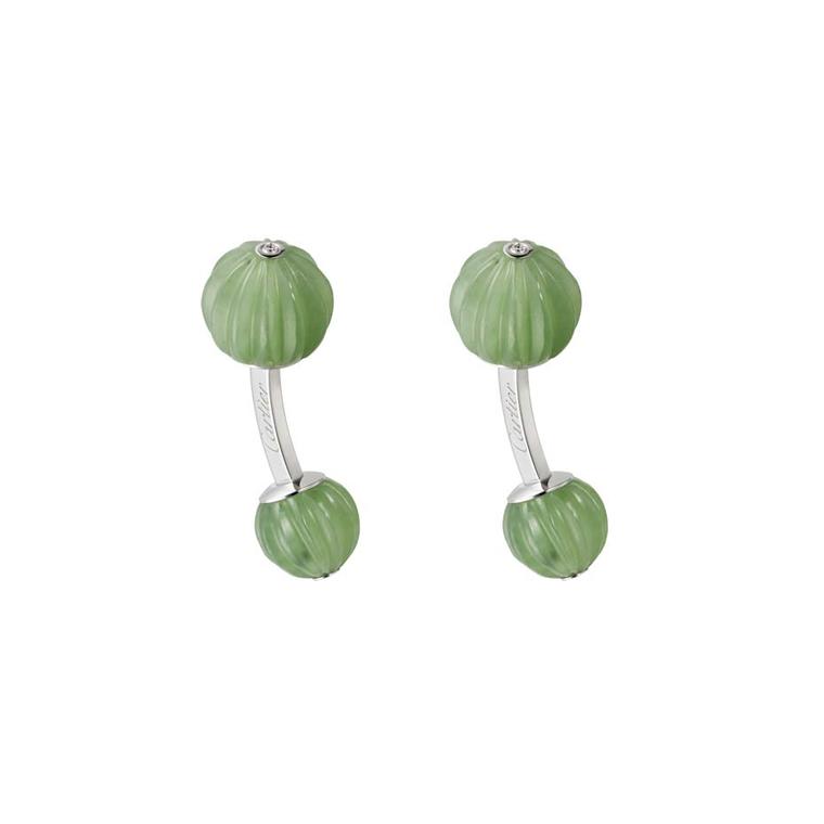 Cartier white gold cufflinks featuring sculpted jade nephrite and diamonds.