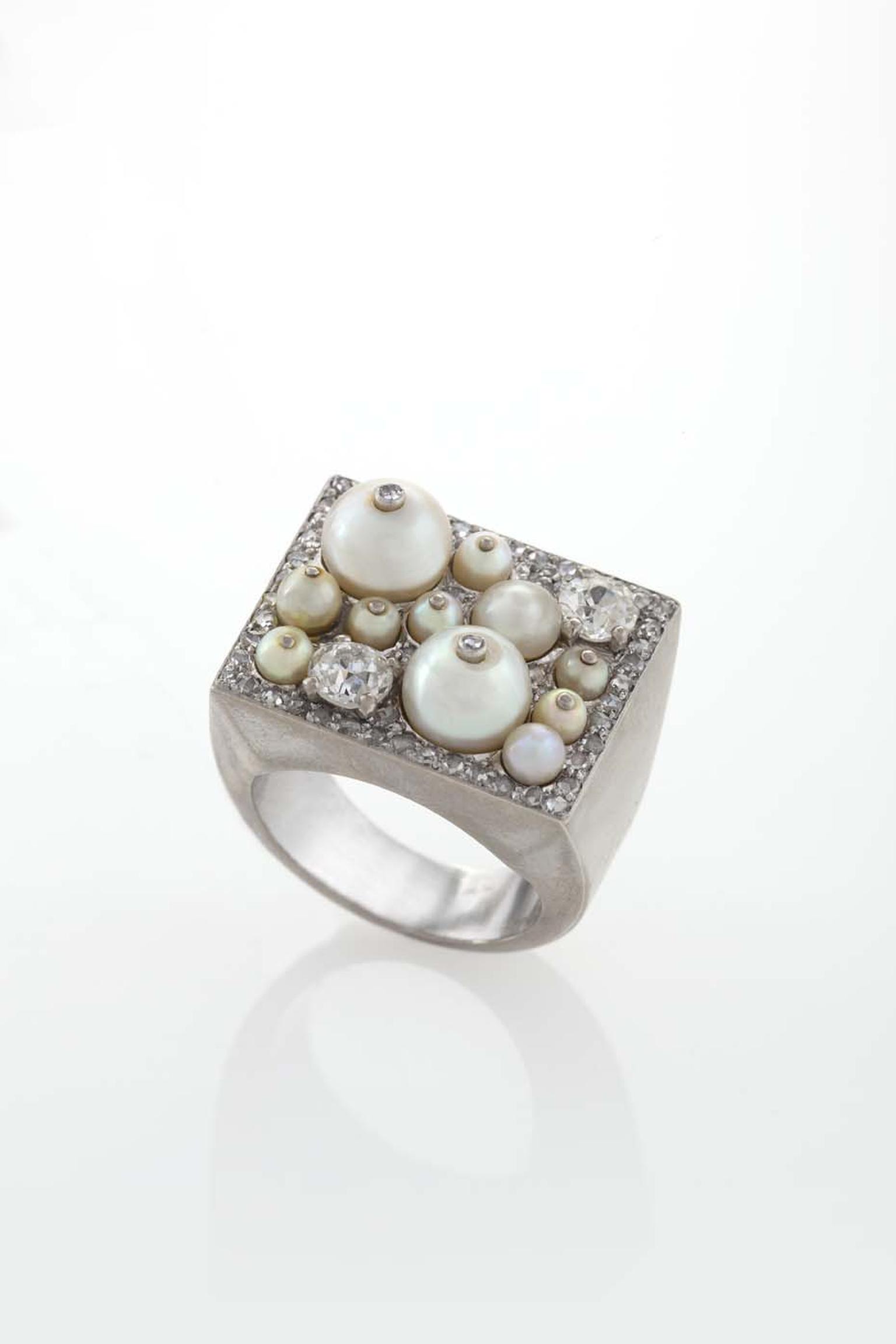 Cartier's Art Deco platinum and diamond ring with pearls, available at the Macklowe Gallery in New York.