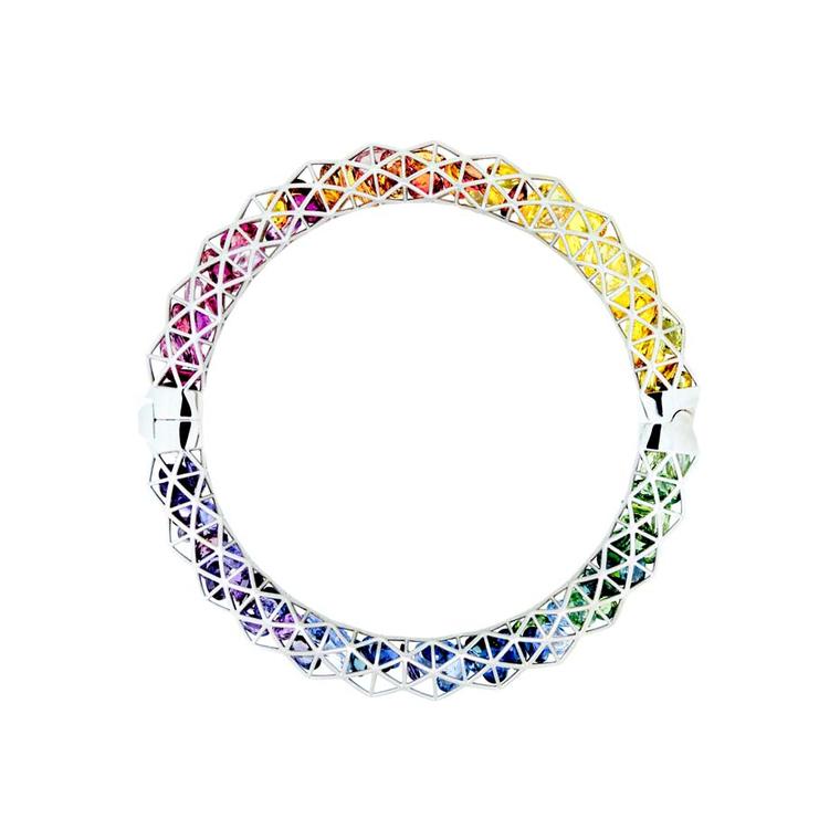Roule & Co. wire caged white gold Triangle bangle containing rainbow sapphires.