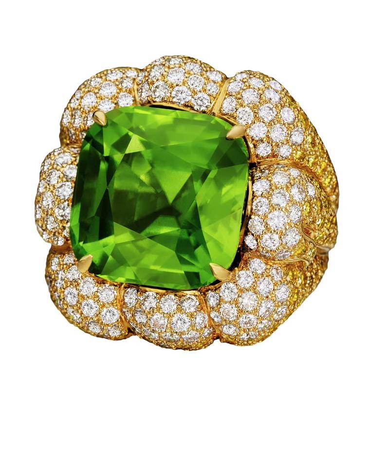 Margot McKinney 28.19ct peridot ring set with white and yellow diamonds.