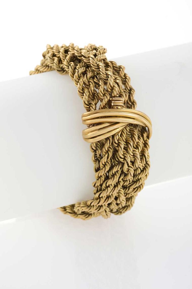 Available at Macklowe Gallery in New York is this French mid-20th century gold bracelet composed of multi strands of smaller twisted gold rope in a braided motif.
